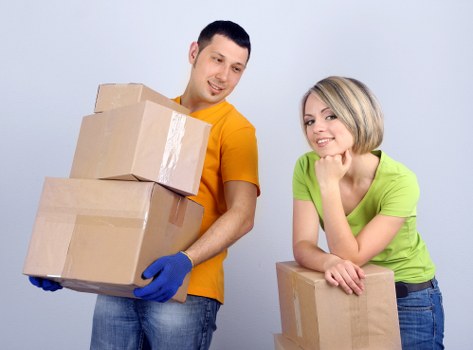 Careful handling of boxes and furniture during a residential move in Shoreditch