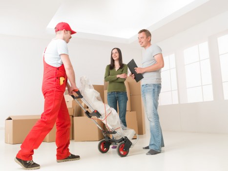 Loading furniture into a removal van for a Shoreditch flat move