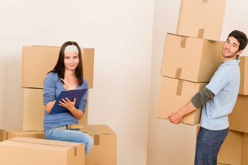 Local house removalists loading furniture for a move in Shoreditch